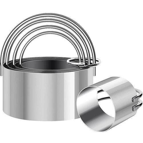 Set of metal cookie cutters on a white background